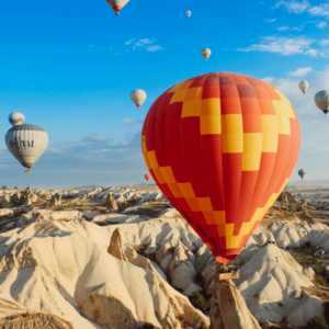 Coaching. orange hot air balloon